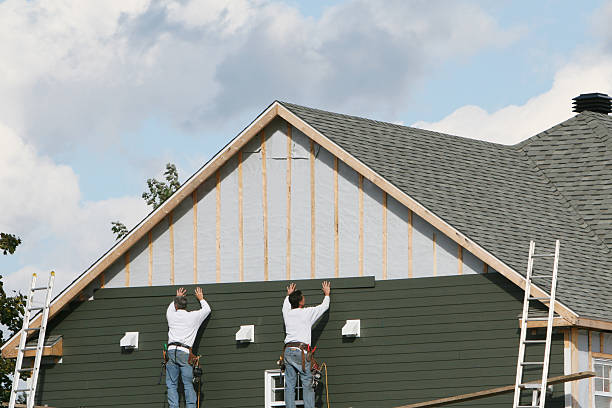 Professional Siding Replacement technician working in Wheaton, IL